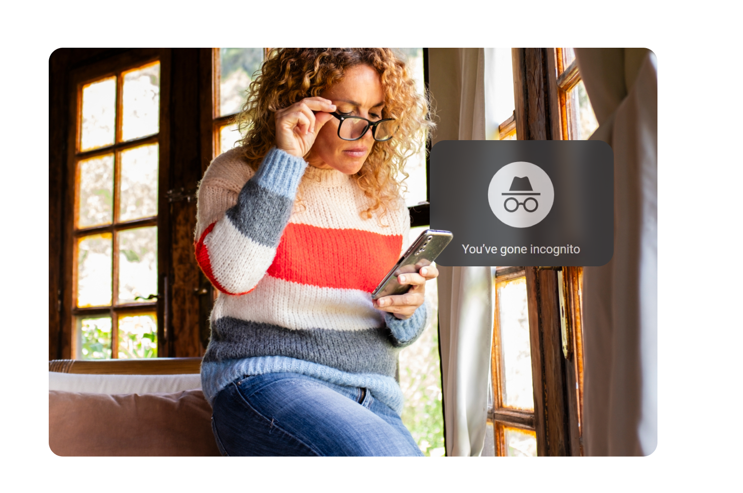 Woman looking at phone incognito mode