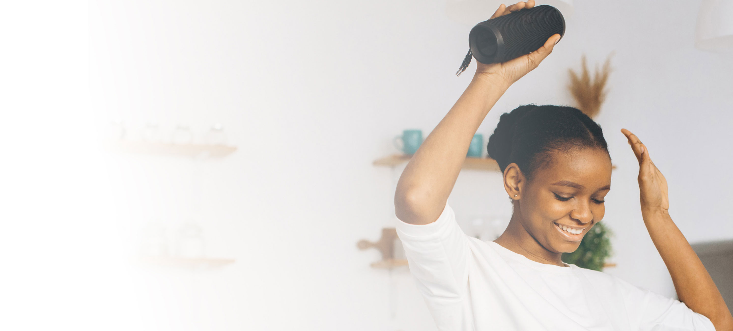 woman dancing with speaker