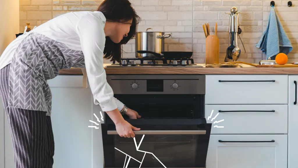 Women looking at broken oven