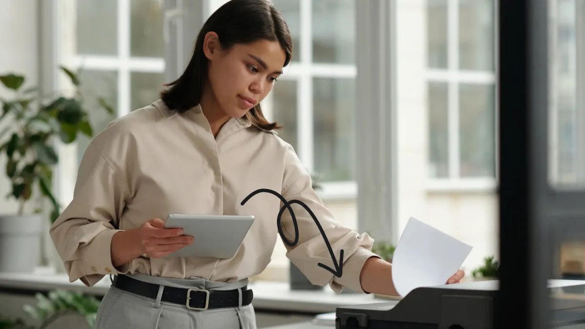Woman setting up printer on iPad