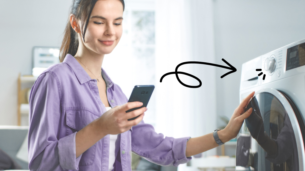 Woman using smartphone to control smart appliance