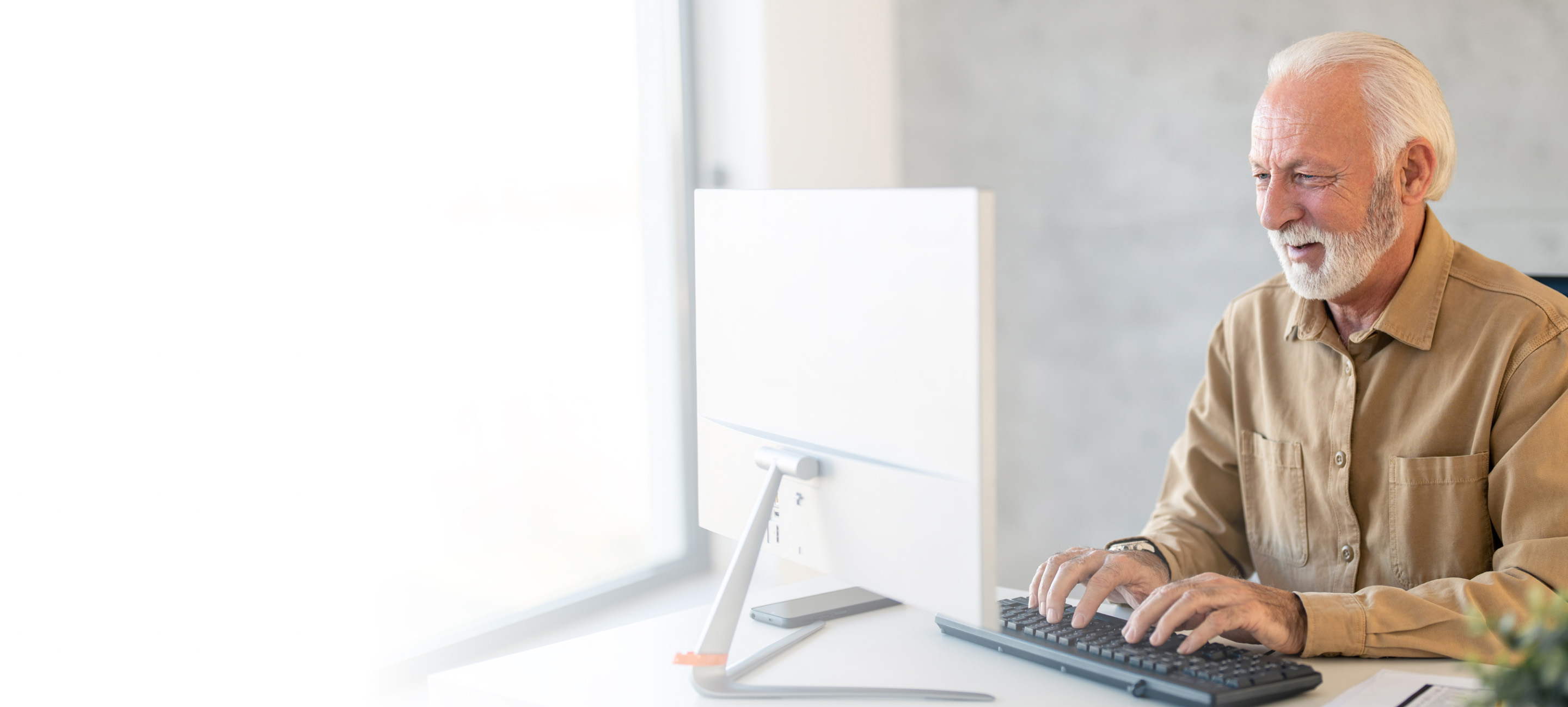 Man typing on keyboard