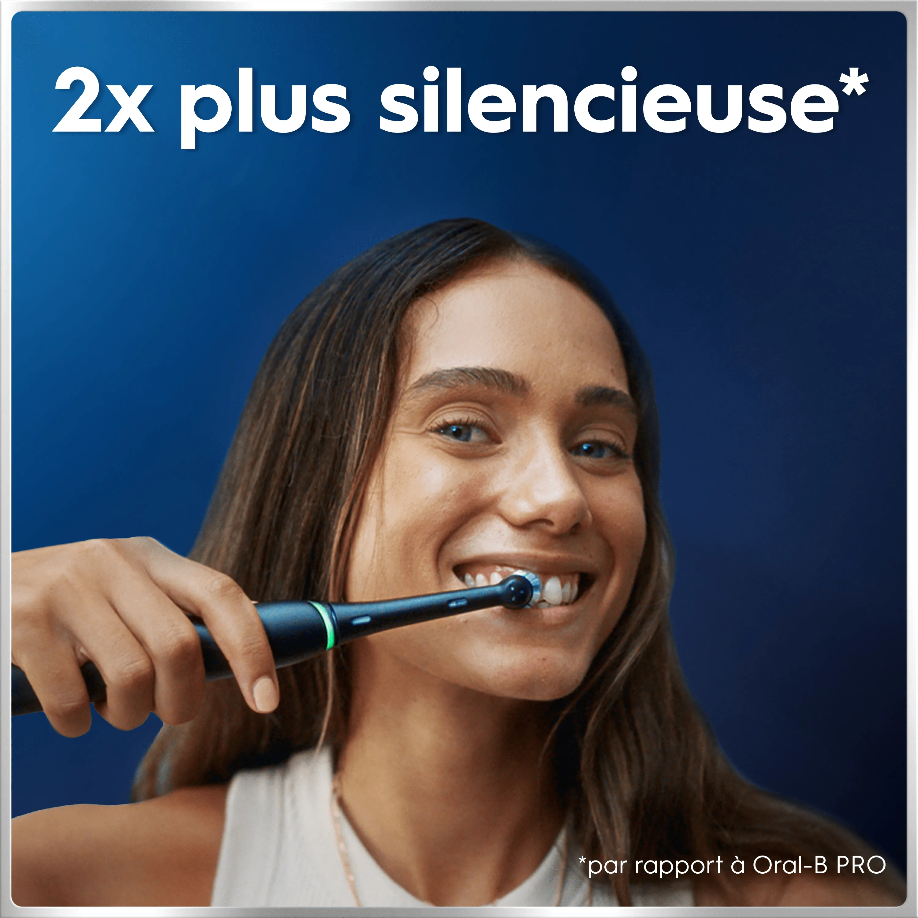 Oral-B: Femme brossant ses dents, la brosse est 2x plus silencieuse.