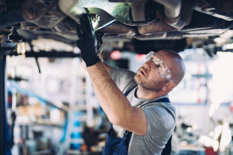 Man working on reparing a car