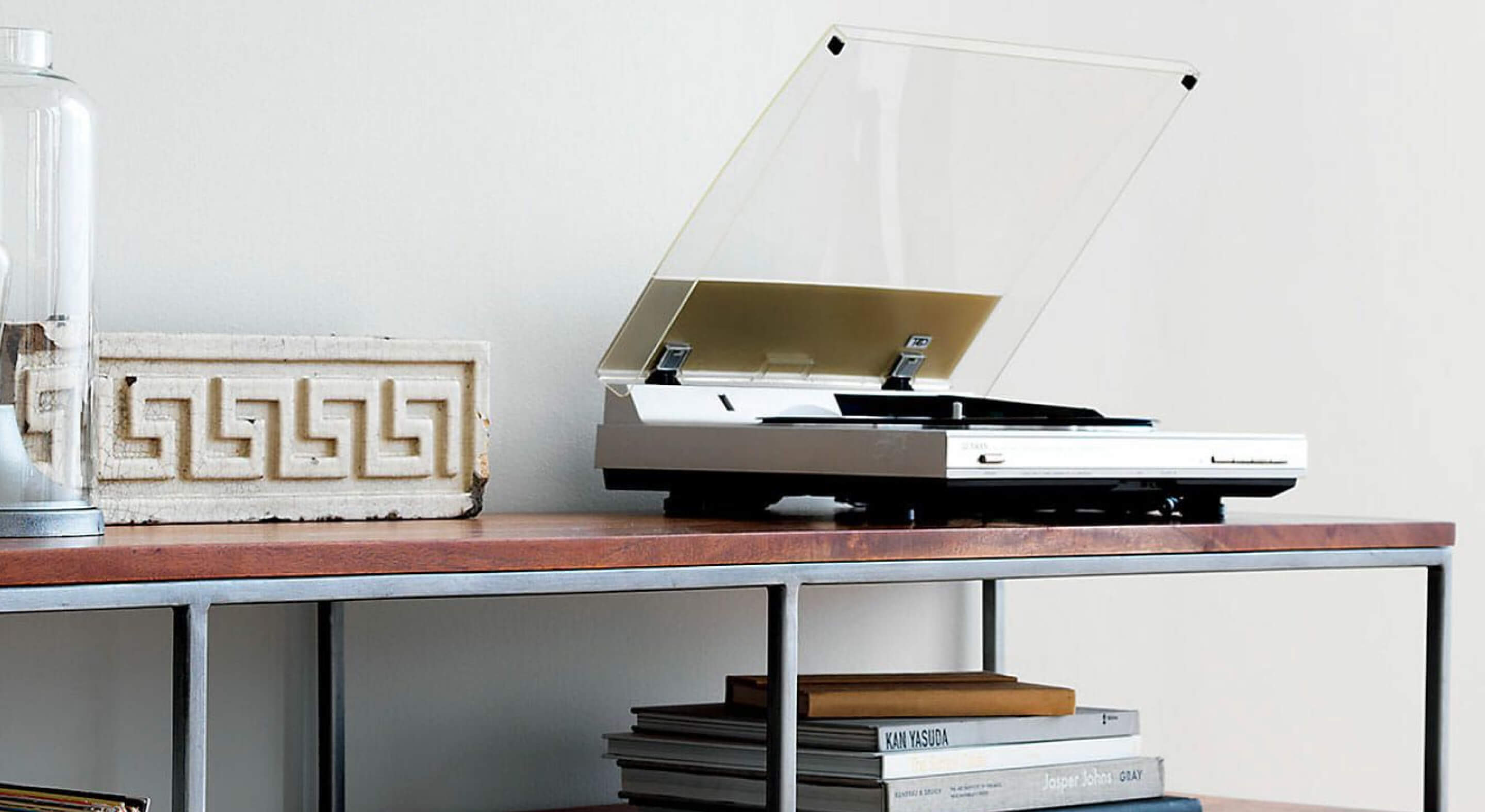 A record player on a piece of furiture
