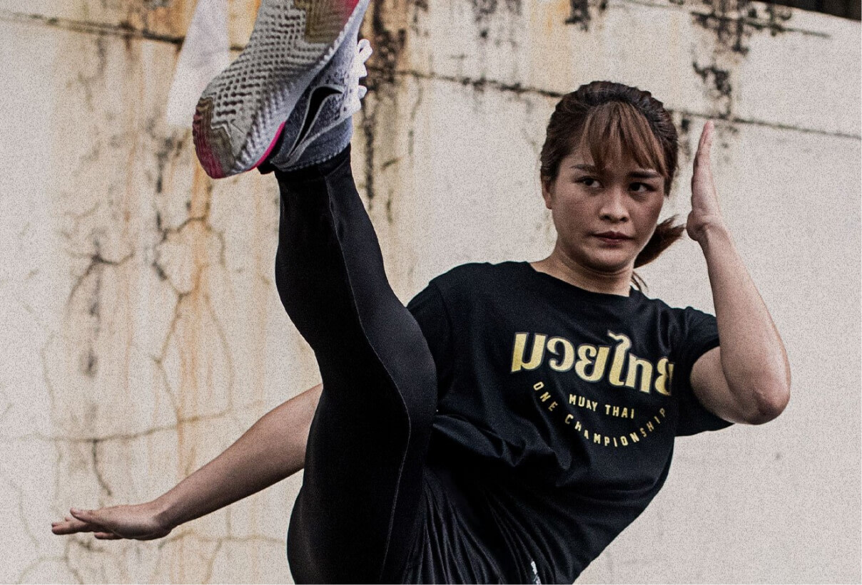 Woman practicing Muay Thai