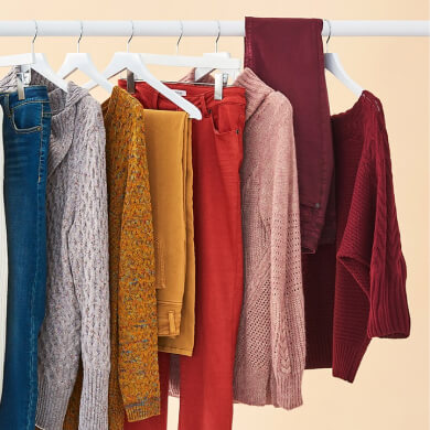 Rack with clothes hanging from hangers
