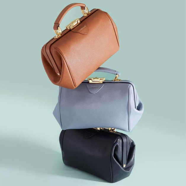 A variety of satchels lined up.