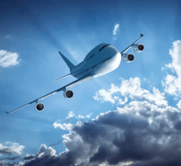 Airplane flying through clouds