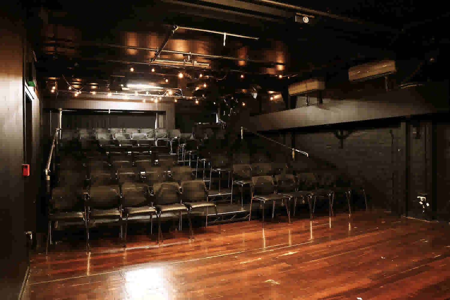 Basement Theatre's smaller Studio performance space showing the seating block and performance area - taken from the stage. 