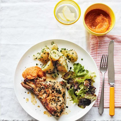 Pork chops with gooseberry ketchup, buttery potatoes and salad