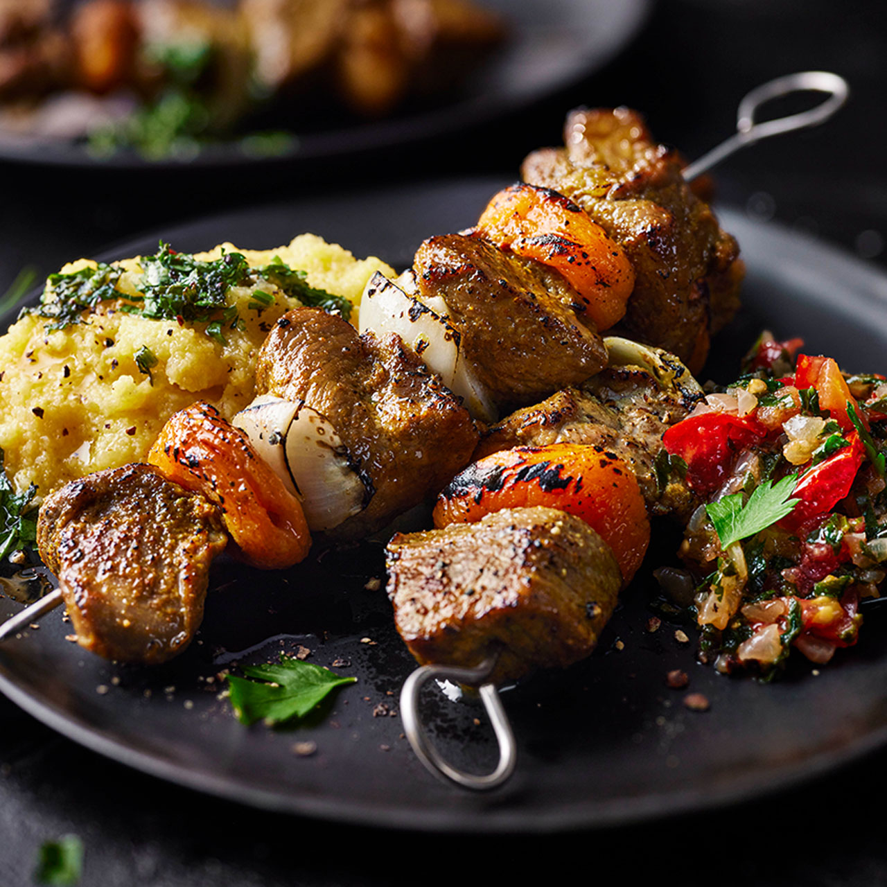 Sosaties with Apricots, Creamy Polenta and Fresh Tomato Relish