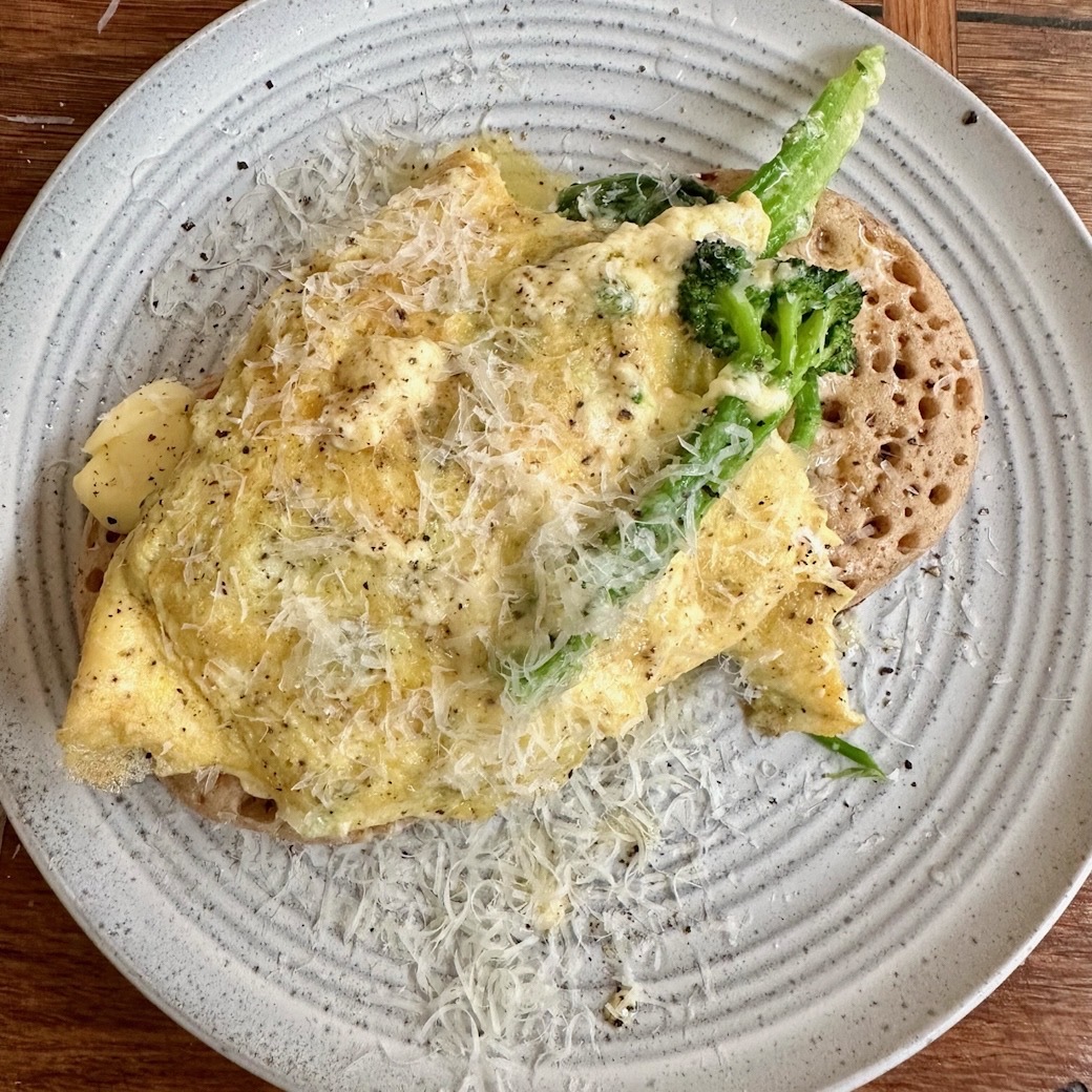 Clotted Cream Omelettes with Greens on Buttered Wholegrain Crumpets