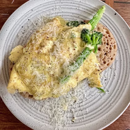 Clotted Cream Omelettes with Greens on Buttered Wholegrain Crumpets