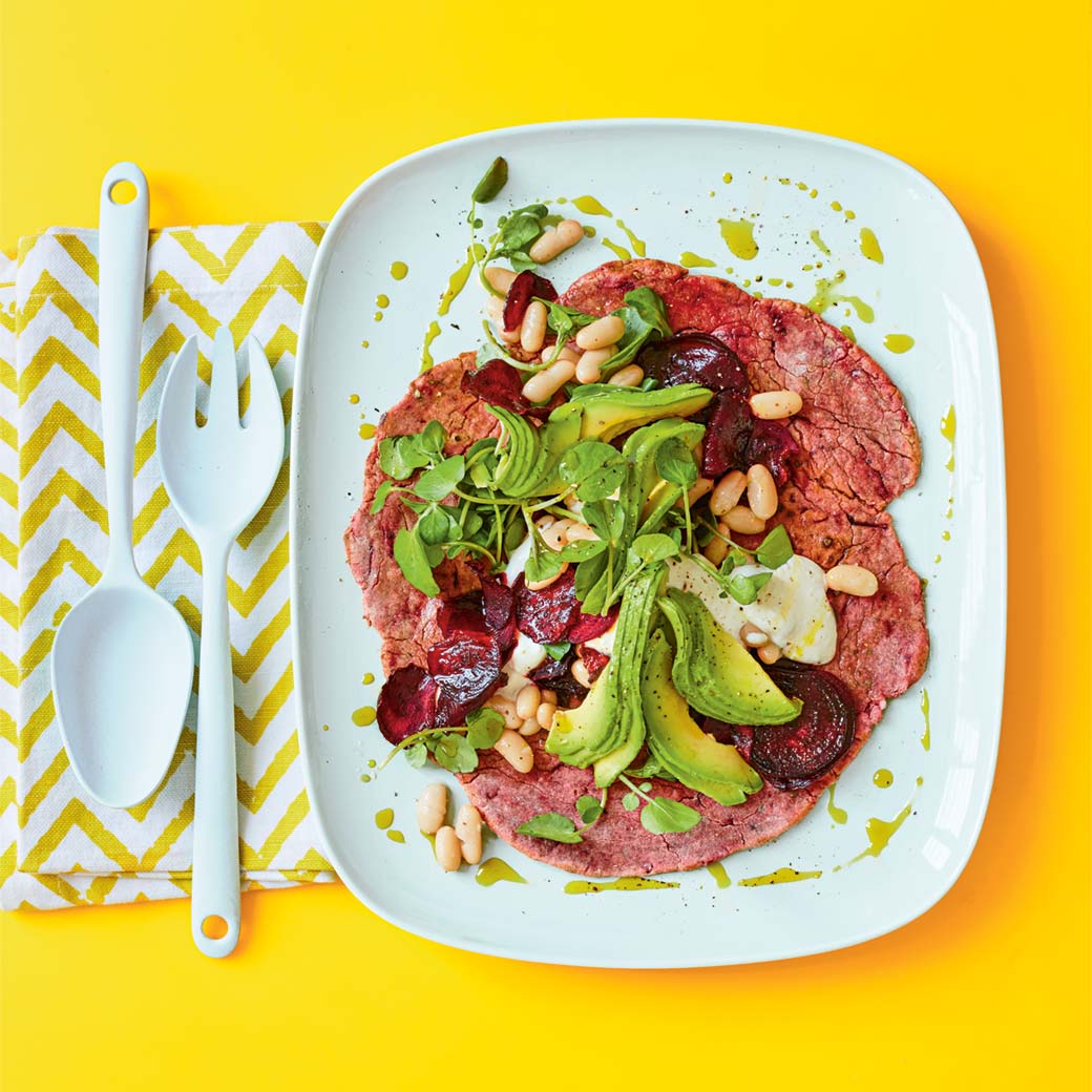 Beetroot wraps with beetroot crisps, whipped feta, avocado and cannellini beans