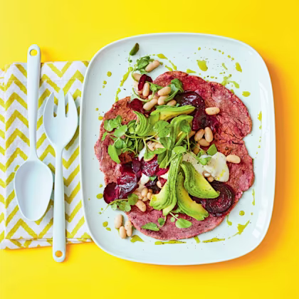 Beetroot wraps with beetroot crisps, whipped feta, avocado and cannellini beans