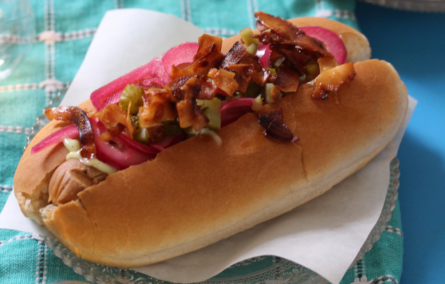 Hot Dogs with pickled pink onions and coconut "bacon"