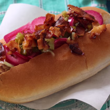 Hot Dogs with pickled pink onions and coconut "bacon"
