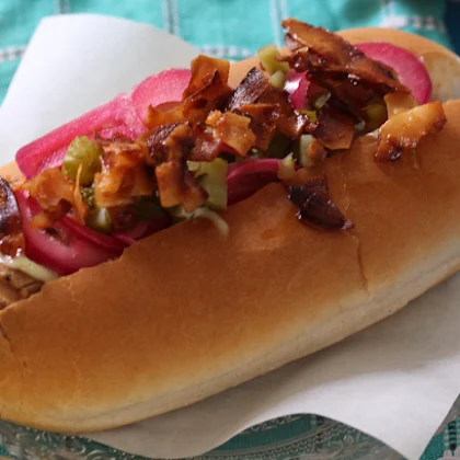 Hot Dogs with pickled pink onions and coconut "bacon"