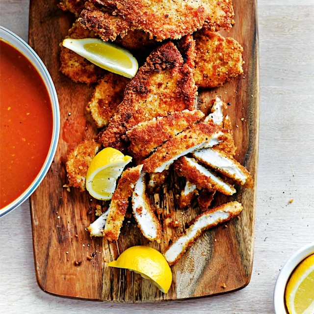 Breaded pan-fried chicken with fresh tomato sauce