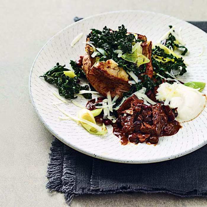 Slow-Cooked Beef Brisket Chilli with Cavolo Nero and Baked Potatoes