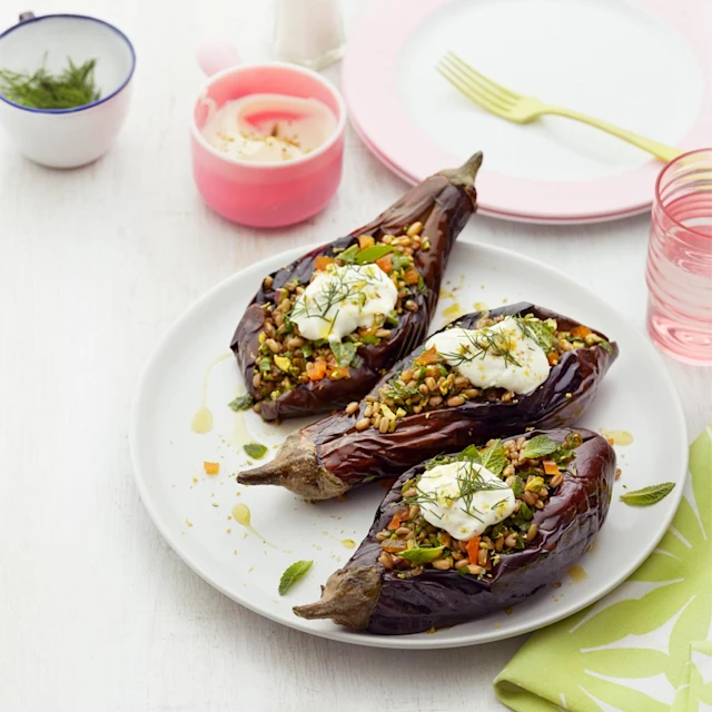 Herby freekeh-stuffed aubergines with pistachio yoghurt