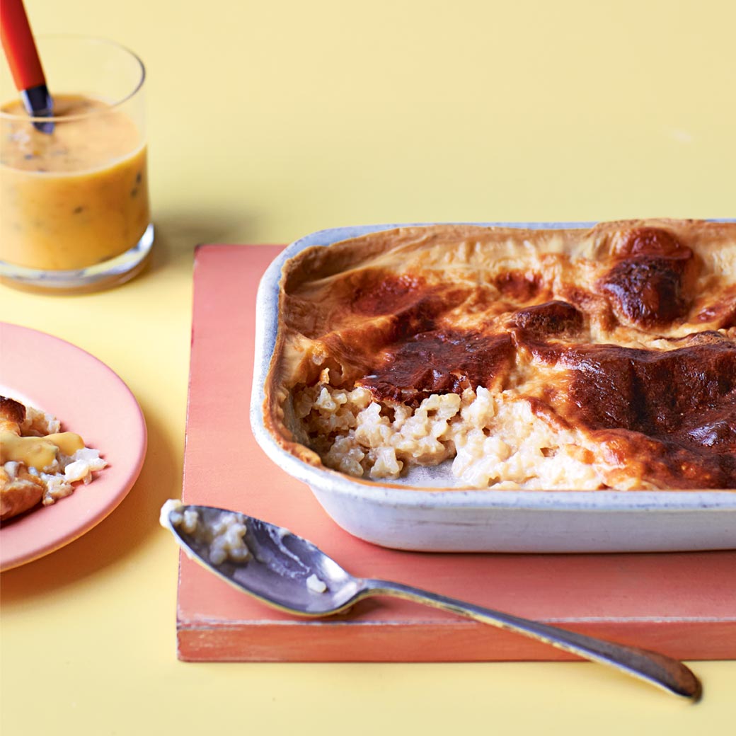 Baked coconut rice pudding with passion fruit curd