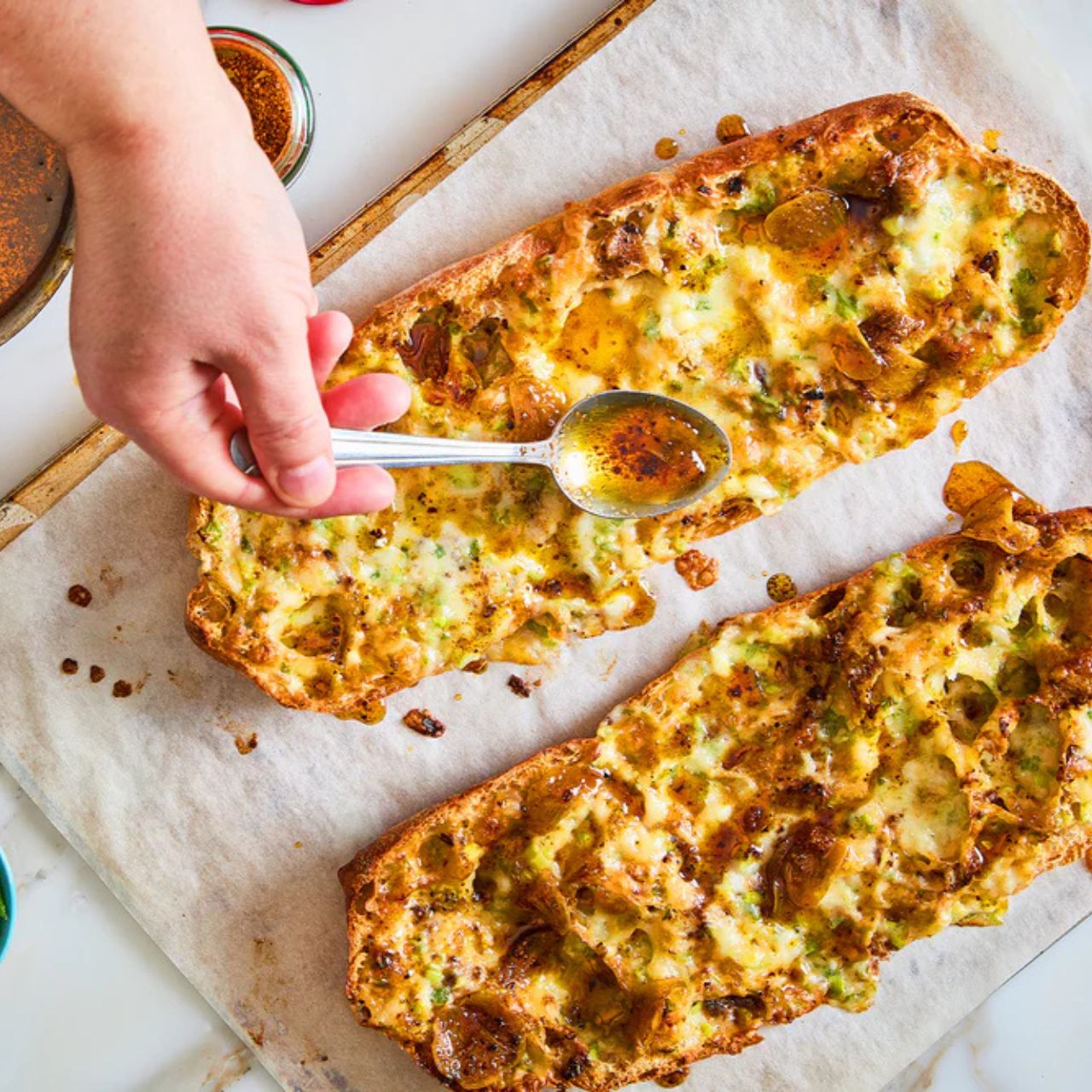 Garlic bread is an undisputed family favourite, but this version by Yotam Ottolenghi really ups the ante. The addition of fresh salad onions and the sweet and smoky spice blend makes this cheesy side incredibly moreish.
