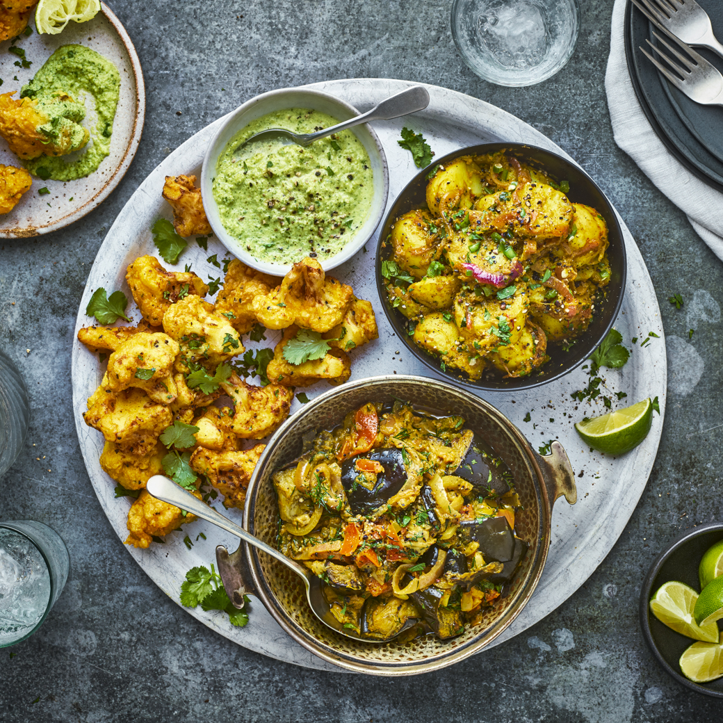 Baingan Masala With Aloo Sabzi and Cauliflower Pakoras