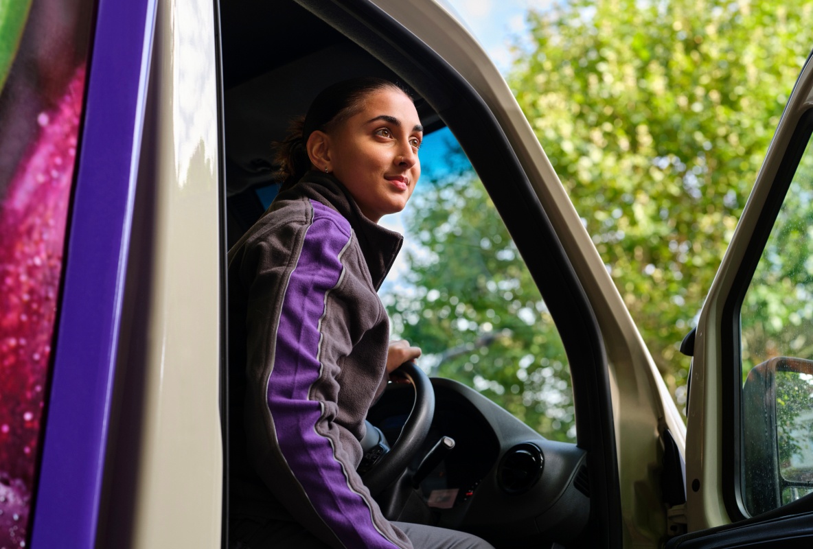 Ocado driver in a van.