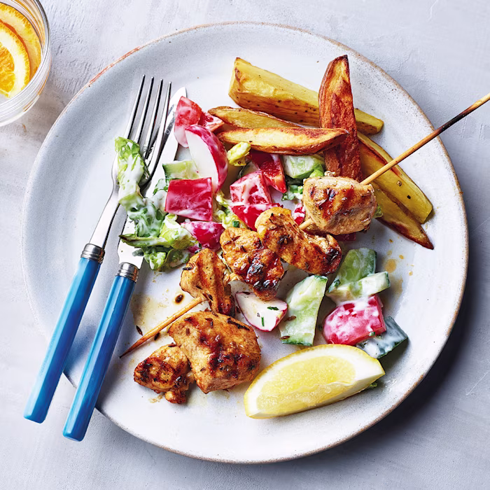 Chicken Kebabs with Chopped Salad and Wedges