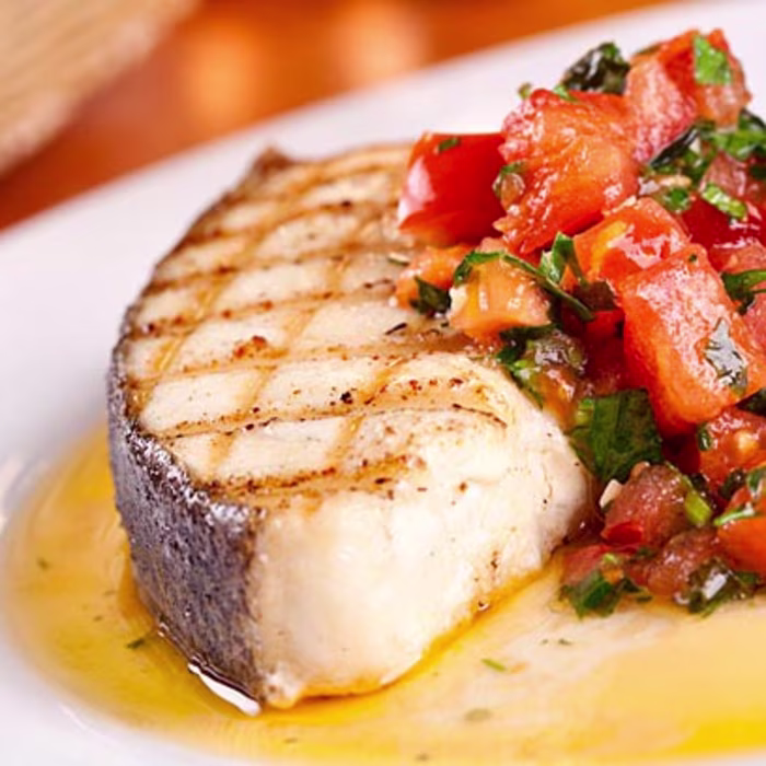 Baked Fish with Tomato, Garlic and Mediterranean Herbs Balsamic Glaze