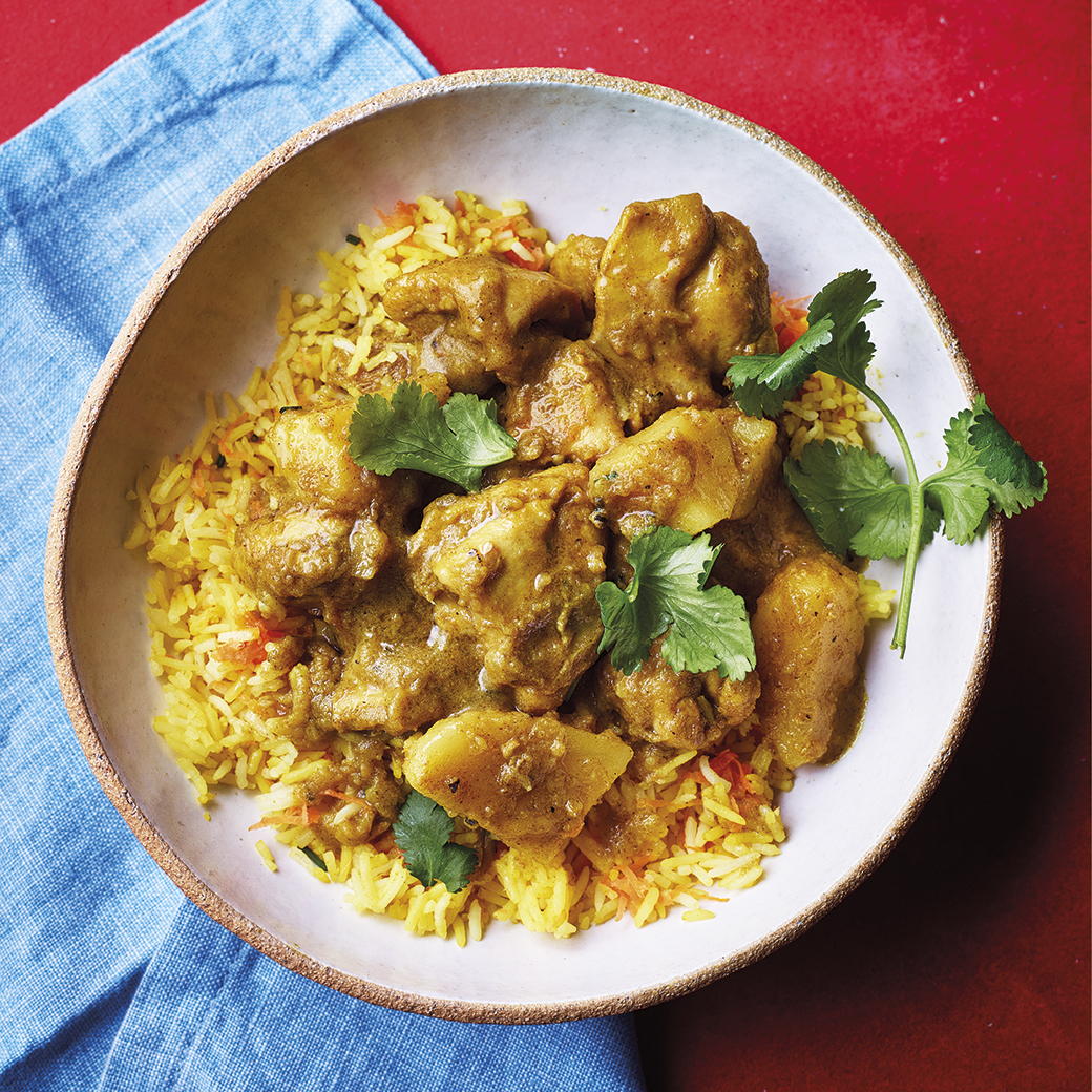 Curry Chicken with Green Seasoning and Golden Rice
