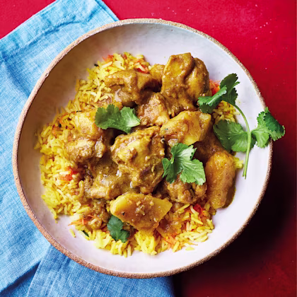 Curry Chicken with Green Seasoning and Golden Rice