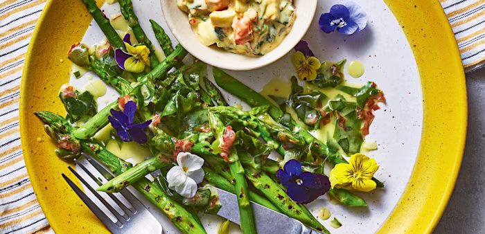 Asparagus salad with vibrant edible flowers