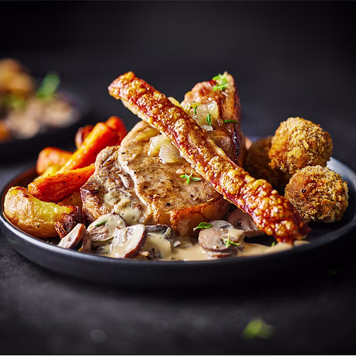 Pan-roast Pork Chops with Crackling and Sausage Bonbons