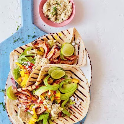 Jerk BBQ chicken wraps with coconut mango salad and cashew cream
