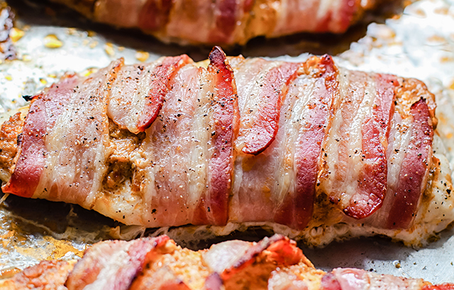 Denhay Bacon Wrapped Sea Bass with Sun-Dried Tomato Pesto