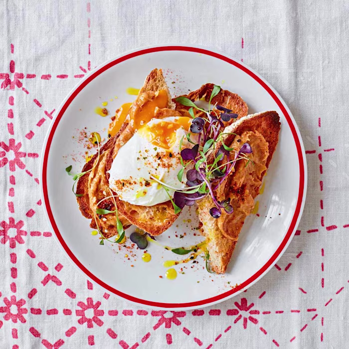Miso buttered toast with micro greens and poached egg