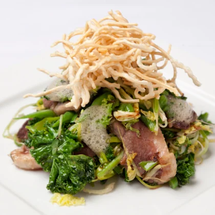 Honey Marinated Duck Breast, Sauteed Greens and Crispy Noodles