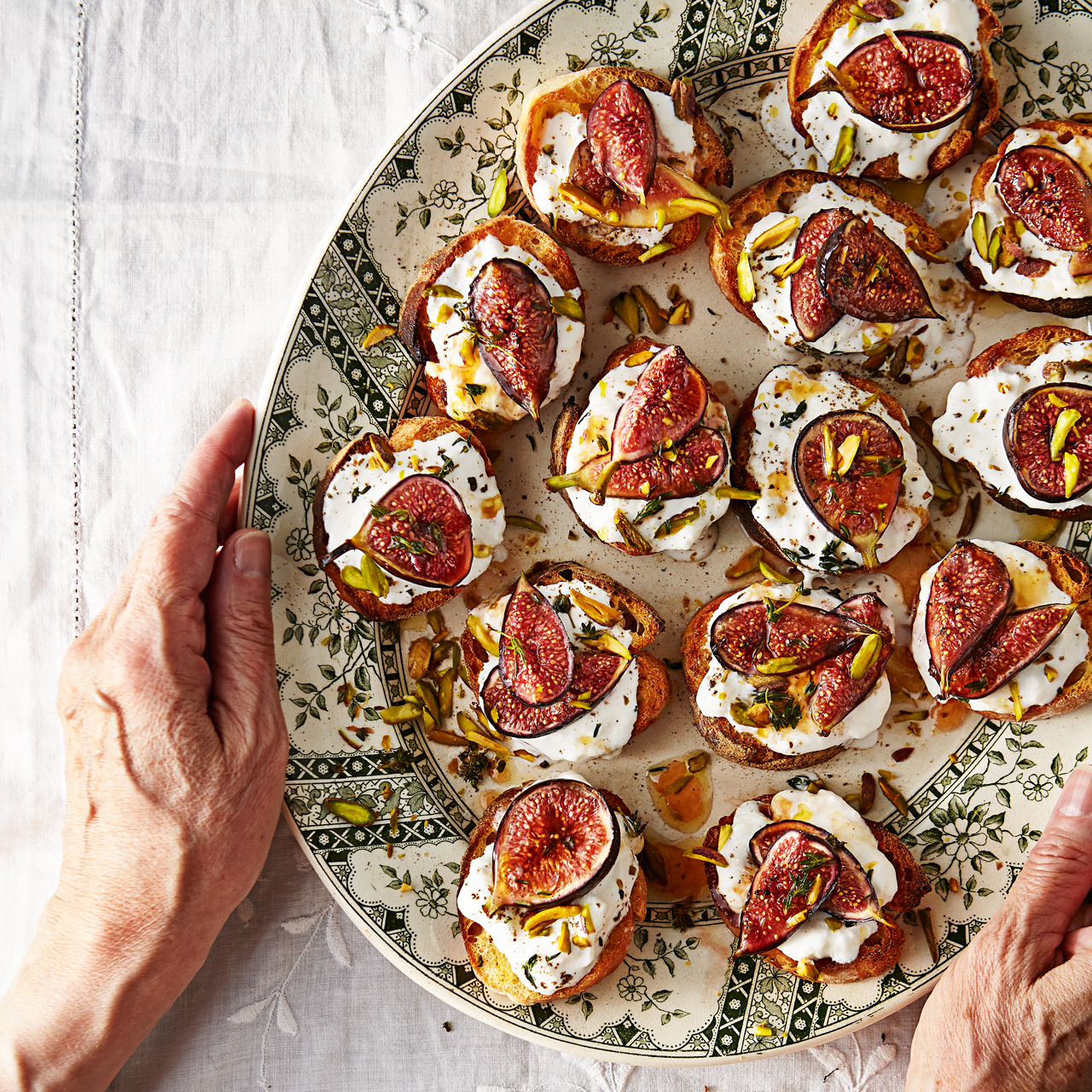 Roasted Fig, Stracciatella and Pistachio Crostini 