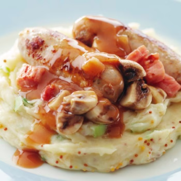 Sausages with Bacon and Mushrooms on Mustard Mash