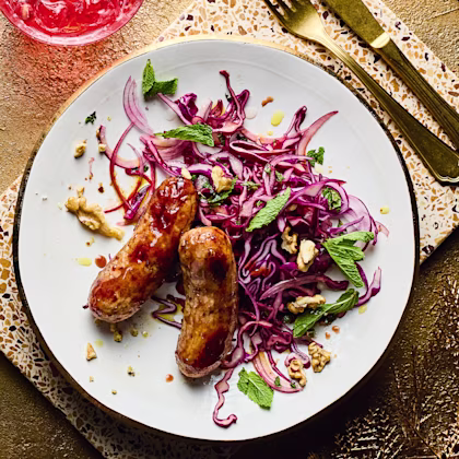 Pomegranate-glazed Sausages with Red Cabbage Slaw