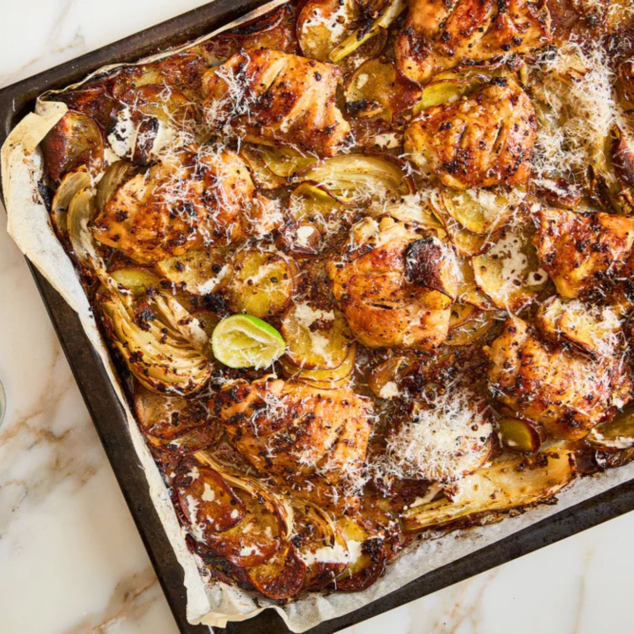 This hands-off midweek dinner by Yotam Ottolenghi combines everything in one tray - the citrus and spice blend brings the chicken to life, while the juices create a delicious sauce to be mopped up with crusty bread.
