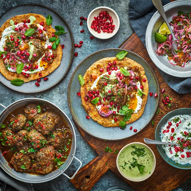 Lamb Vhura with Spicy Onions, Pomegranate Raita, and Coriander Chutney