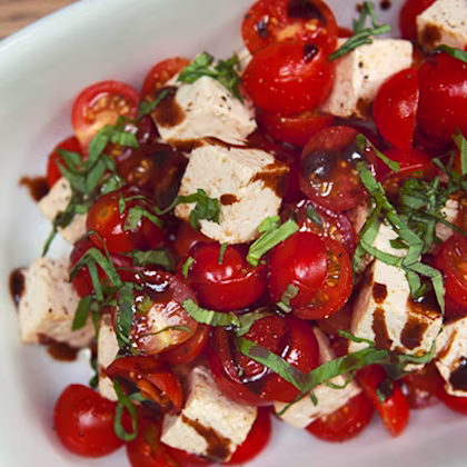 Cauldron Tofu Block with Cherry Tomato, Balsamic Glaze, Olive Oil, Cracked Black Pepper and Basil