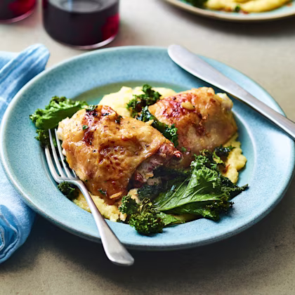 Garlic Chicken Thighs with Cacio e Pepe Polenta and Crispy Kale