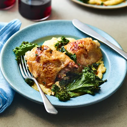 Garlic Chicken Thighs with Cacio e Pepe Polenta and Crispy Kale