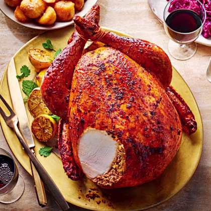 Harissa and Buttermilk Roast Turkey with Merguez and Couscous Stuffing