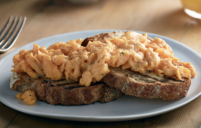 Luxurious scrambled eggs with Mustard with Chablis white wine and Morel mushrooms